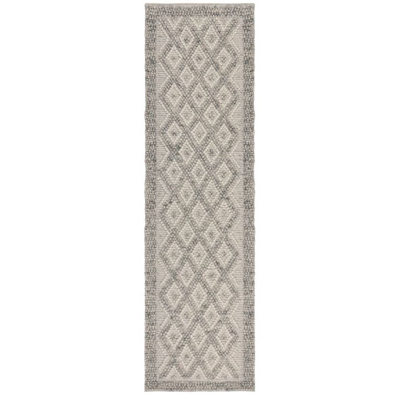 Tapis en laine effet relief beige Border